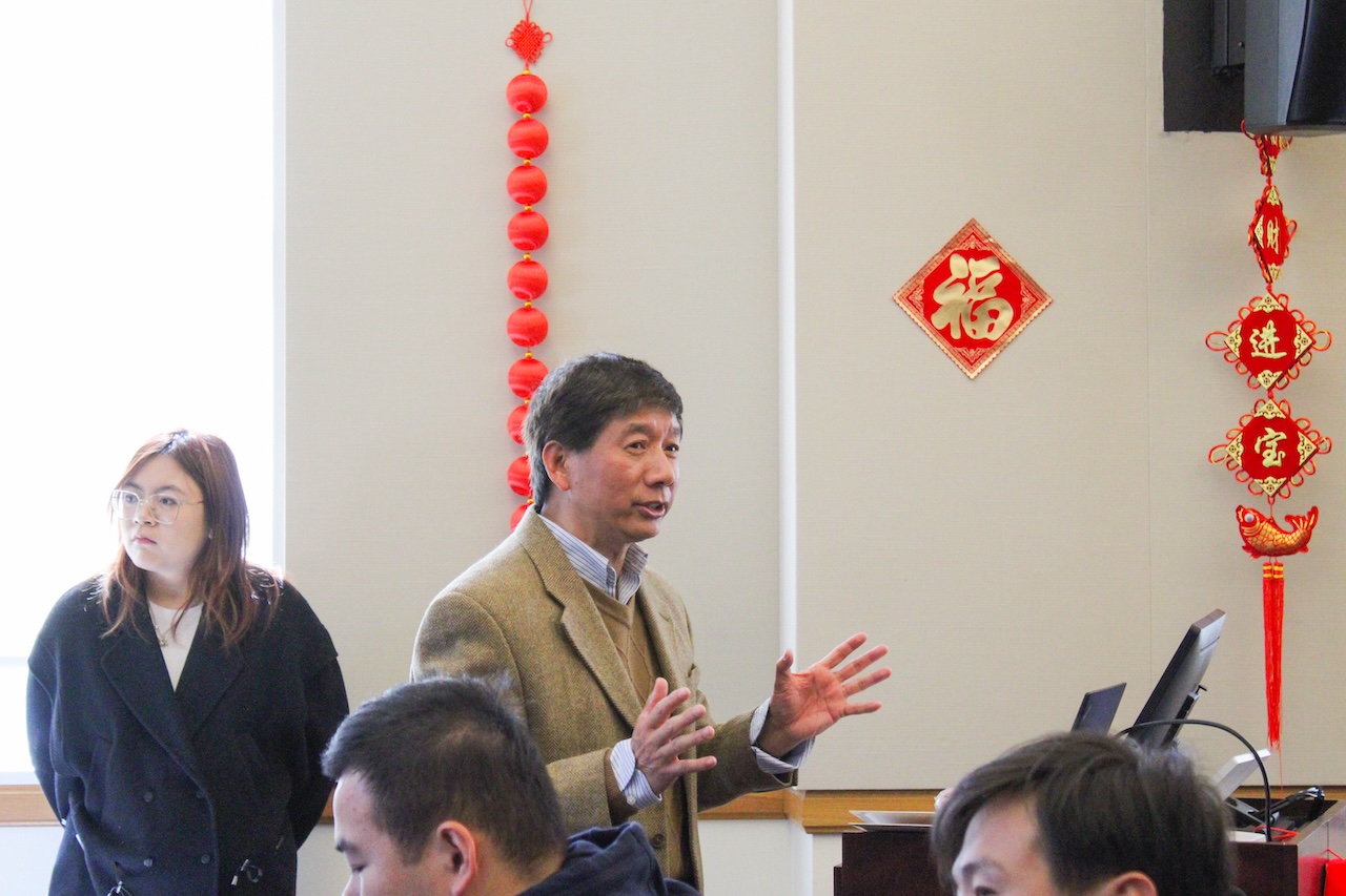 Professor Speaking to Students at the Celebration