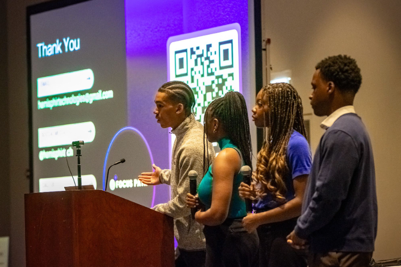 Travis pyror and focus path AI team presenting in SMU.