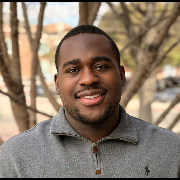 A headshot of Chris Ageh in smu lyle.