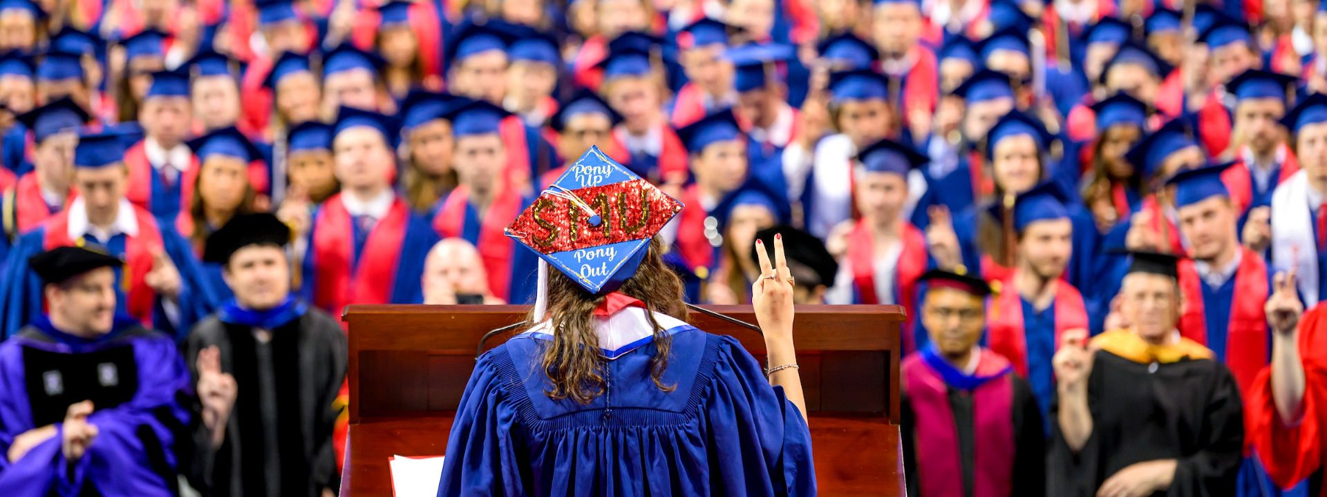 Speaker addressing students at graduation ceremony