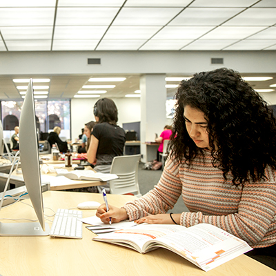 Student studying in the library