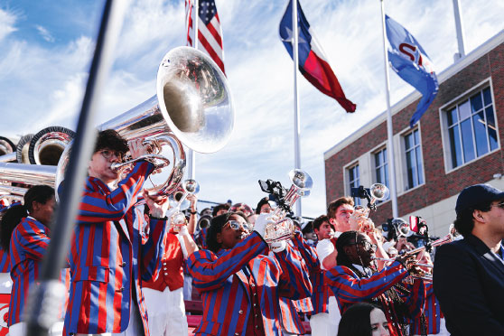 SMU Mustang Band and spirit squads performing at an outdoor event