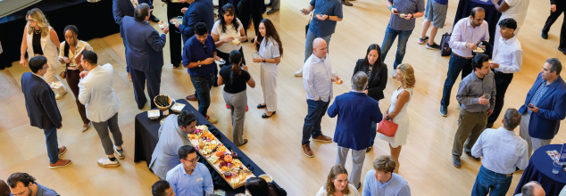 Participants talking during an SMU networking session
