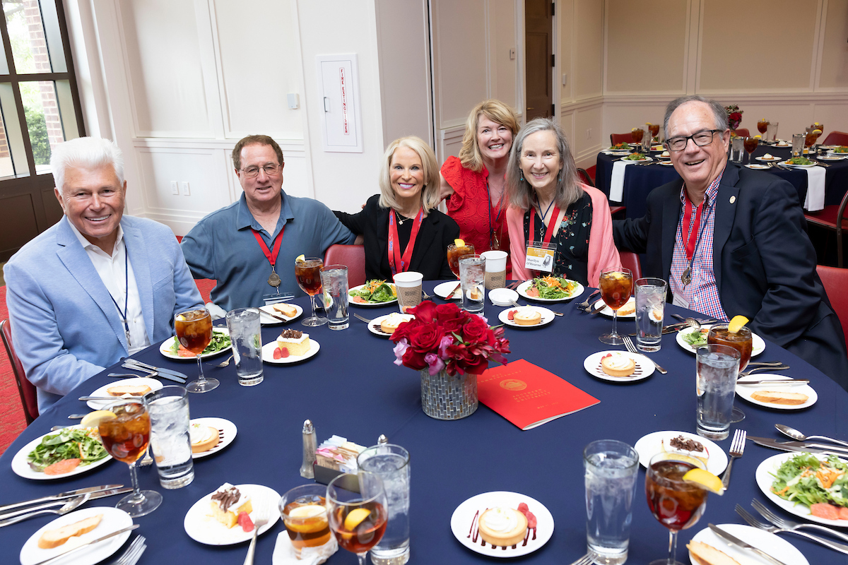 Class of 1975 eating at class reunion