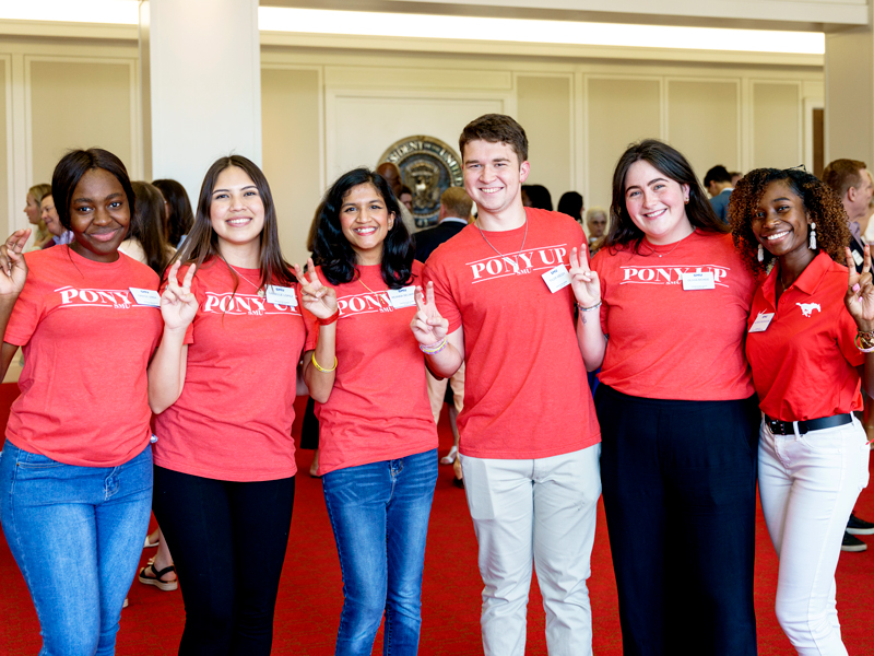 SMU Summer Send-off party pic with red Pony Up t-shirts