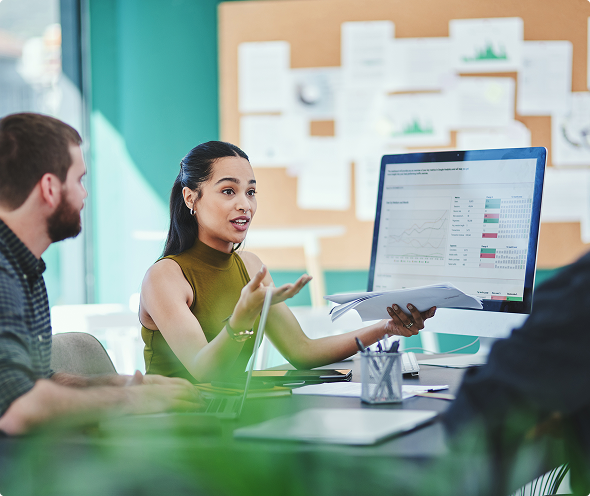 Woman in a meeting discussing data