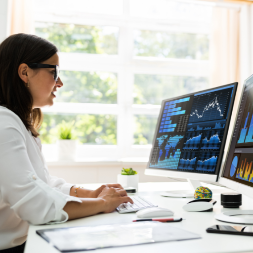 Woman looking at reports on the computer
