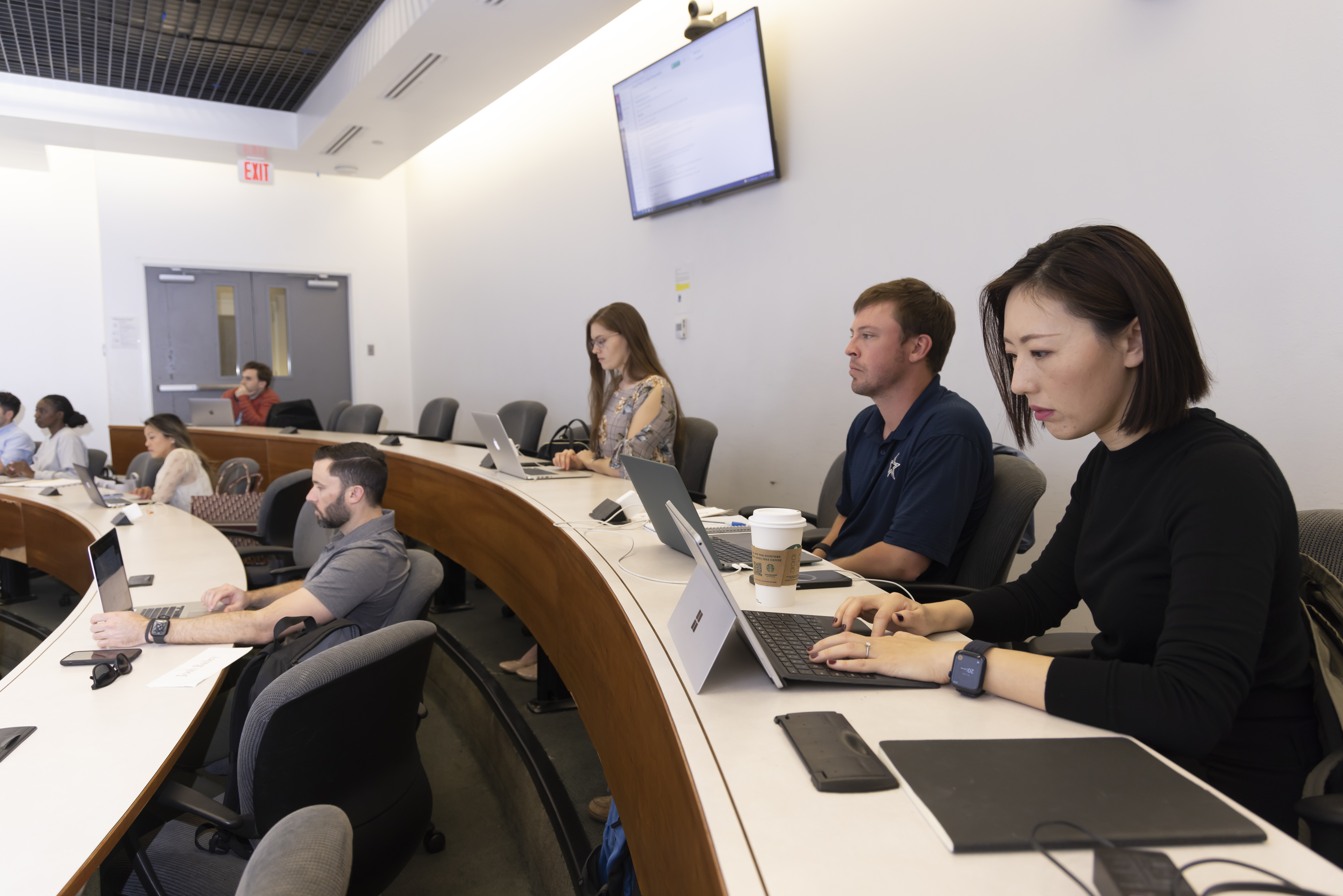 Room of students in class at SMU Cox