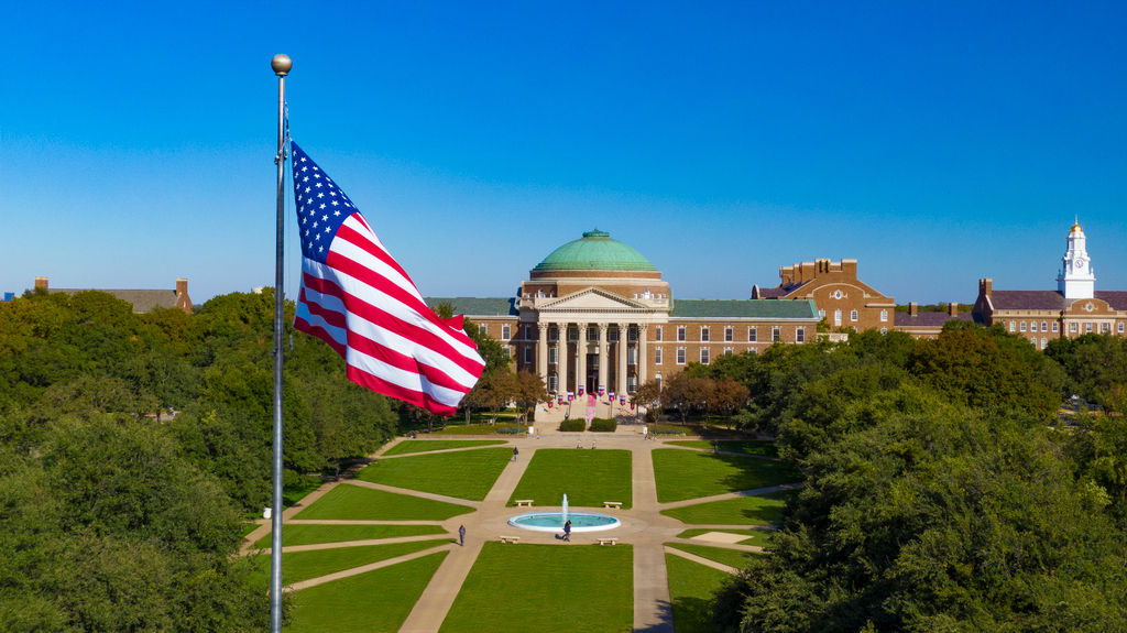 Flag on Dallas Hall lawn