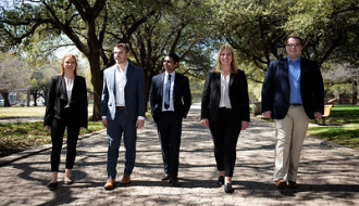 Photo of students in the Cox Graduate Finance Club