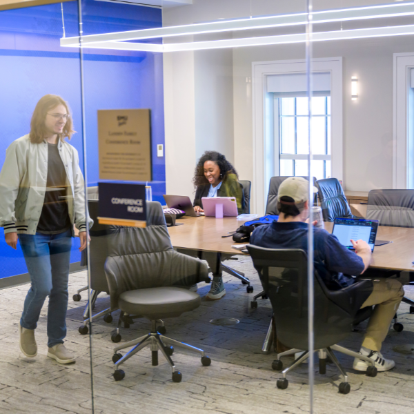 photo of students in a conference room
