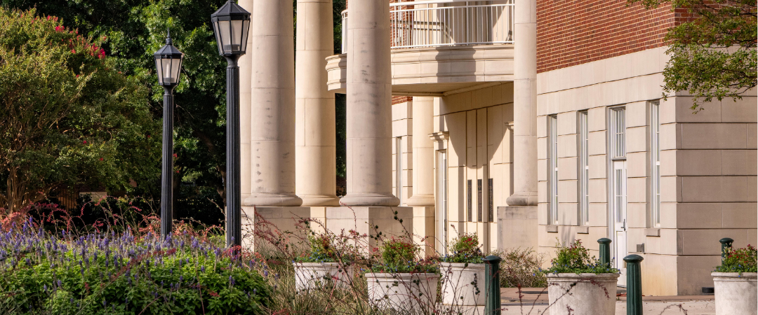 side of maguire hall at smu cox