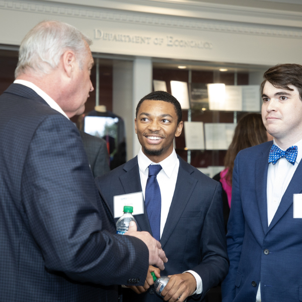 students and board member at folsom event