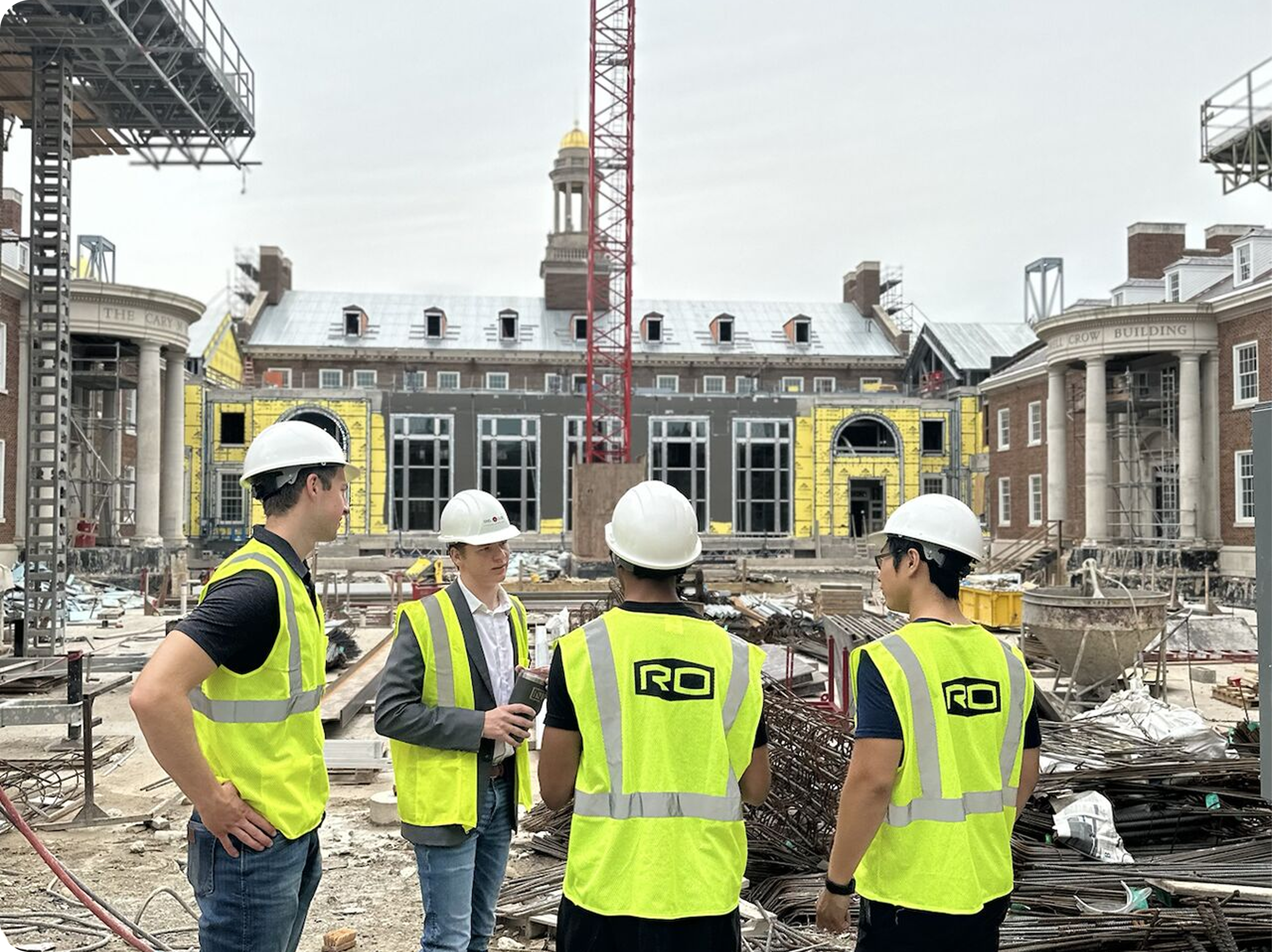 students on construction site at SMU Cox