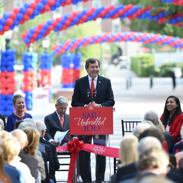 RGT in front of new buildings on campus