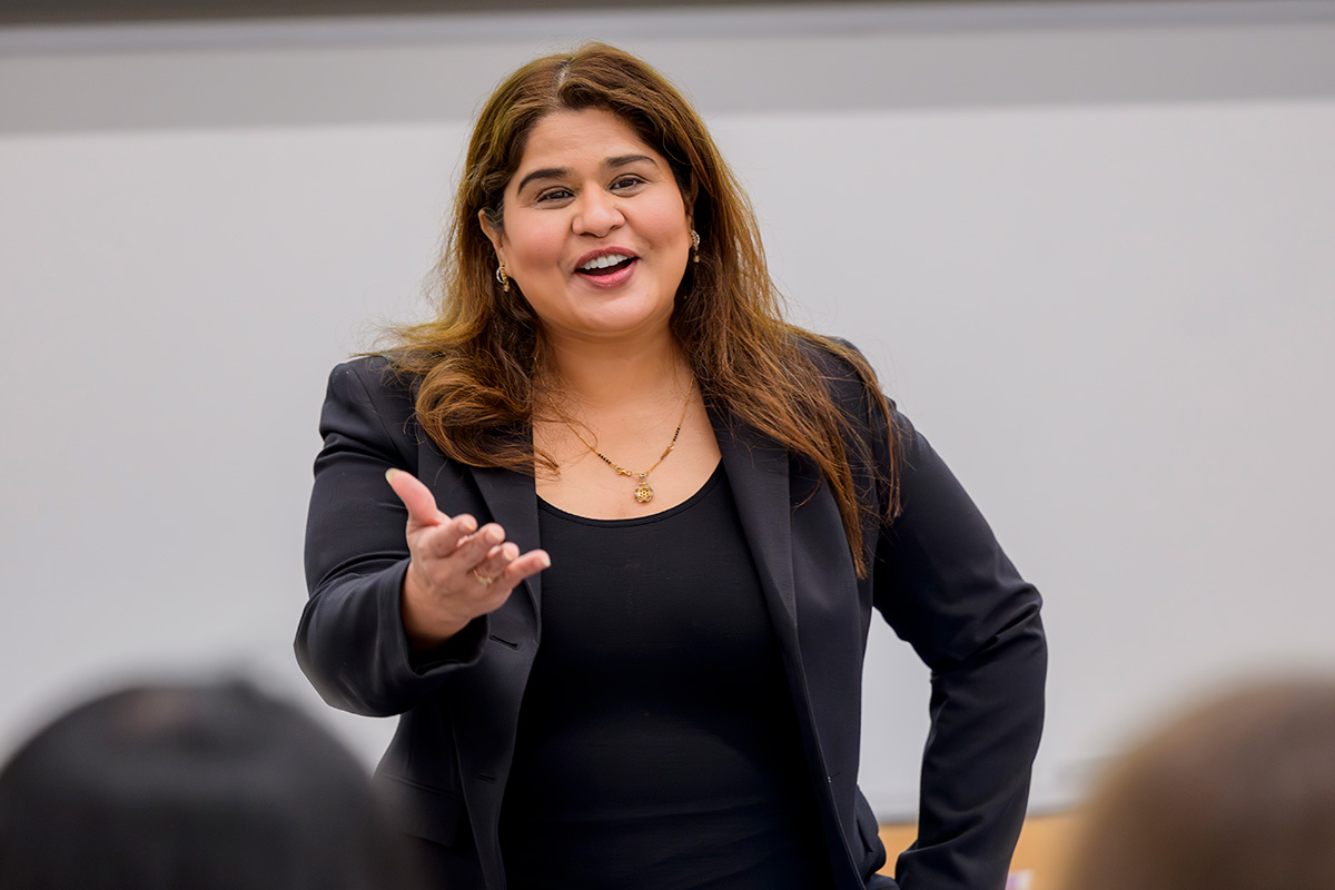 Gauri Bhat lectures to students in a classroom