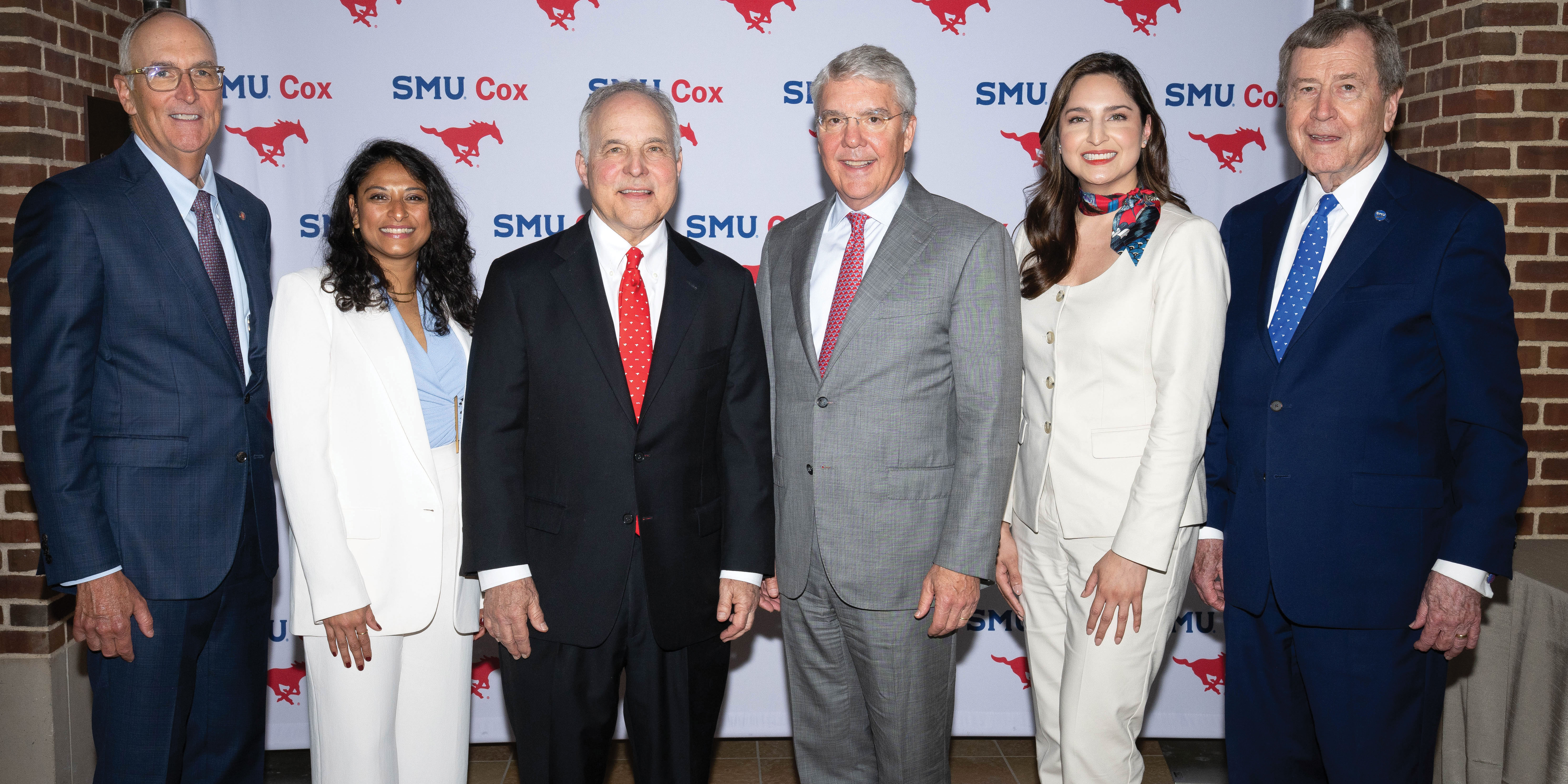 Alumni award honorees Amrita Vir, B.B.A. ’12, Bill Shaddock, MBA ’74, Jim Landen, Sr., B.B.A. ’82, and Gloria Salinas, B.A., ’10, EMBA ’23