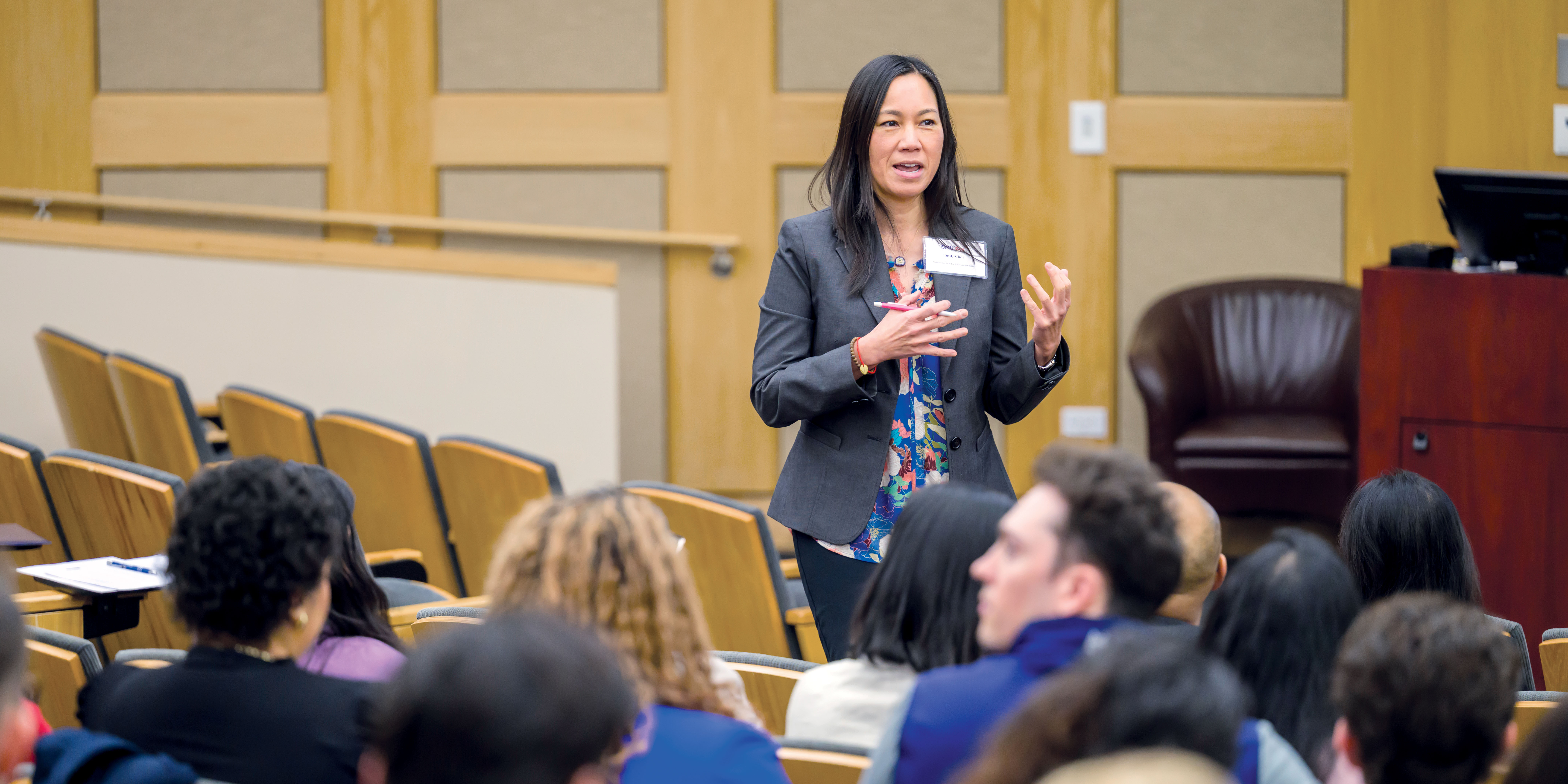 Emily Choi lectures to students in a lecture hall