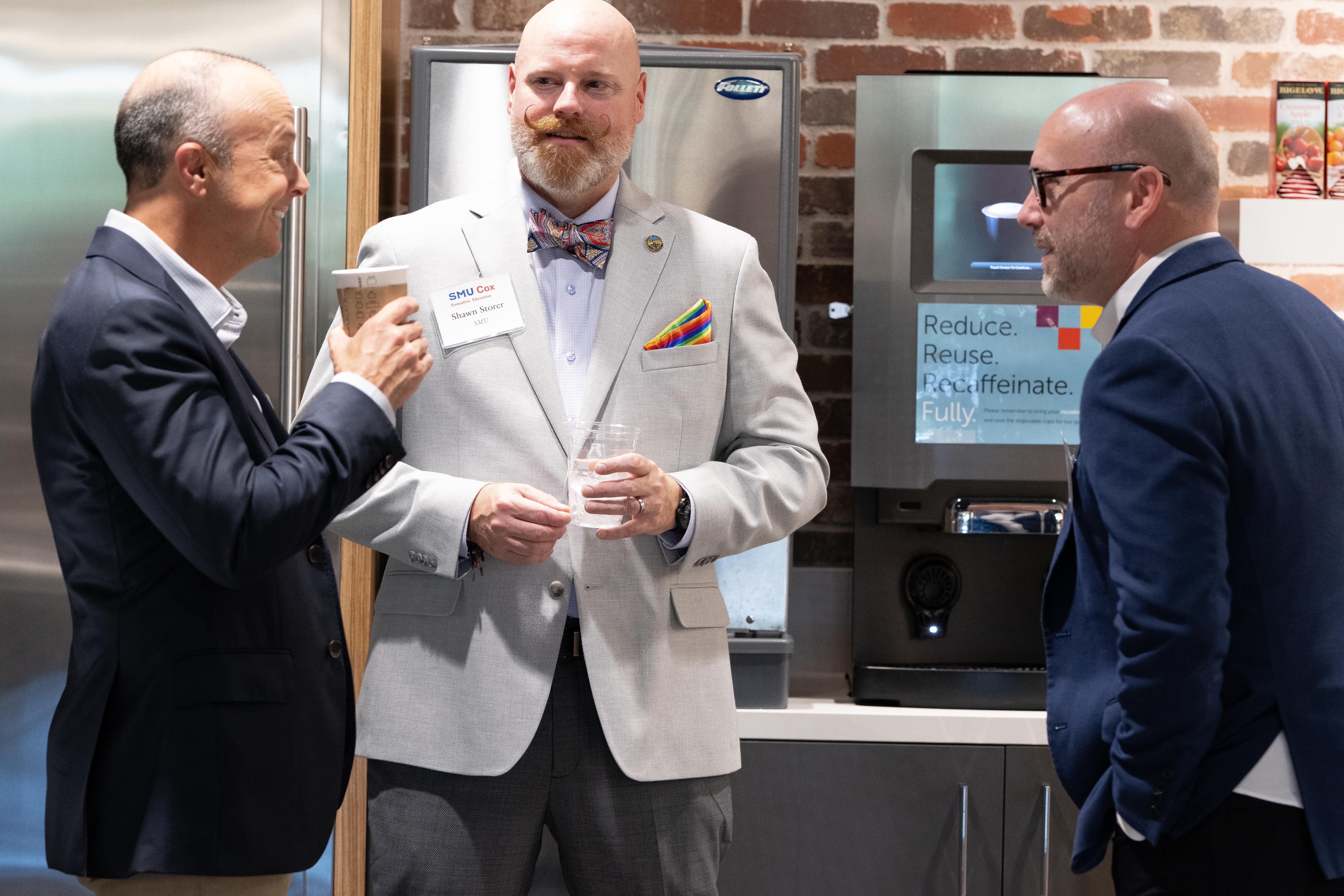 conversation amongst faculty at HRRT