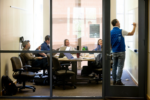 Photo of students working together at SMU Cox