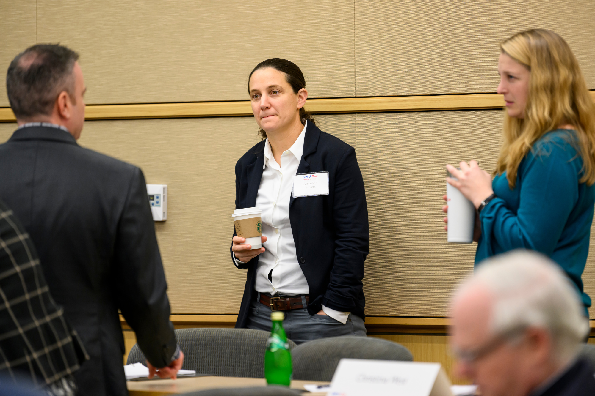 audience asking questions at Collins Center