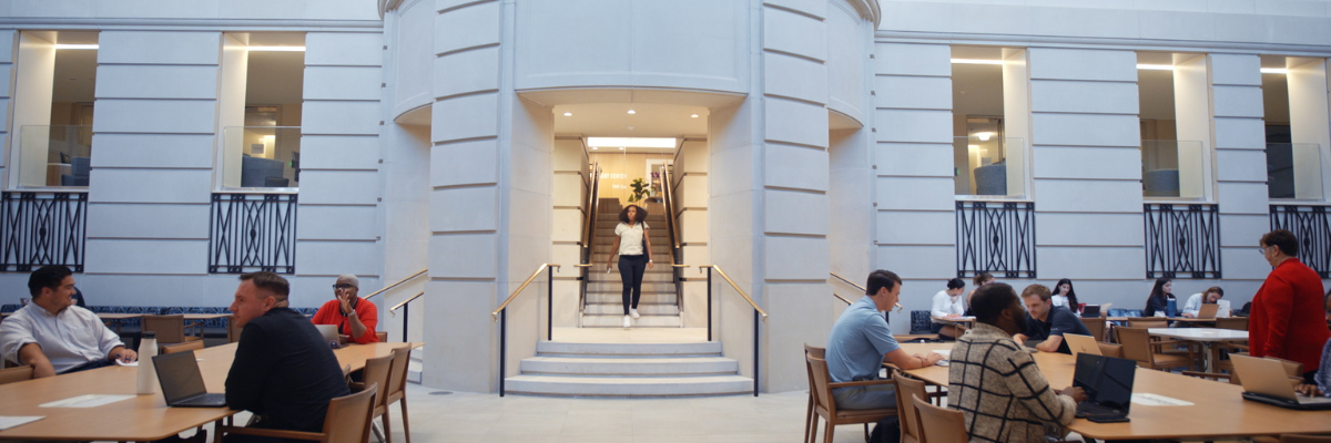 photo of students in the lower level of the Cox School