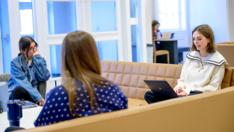 Students in conversation at Cox School