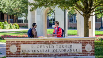 Students outside Cox School