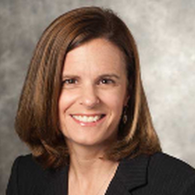 A headshot of Maribeth Kuenzi, a member of the SMU Cox Online MBA faculty