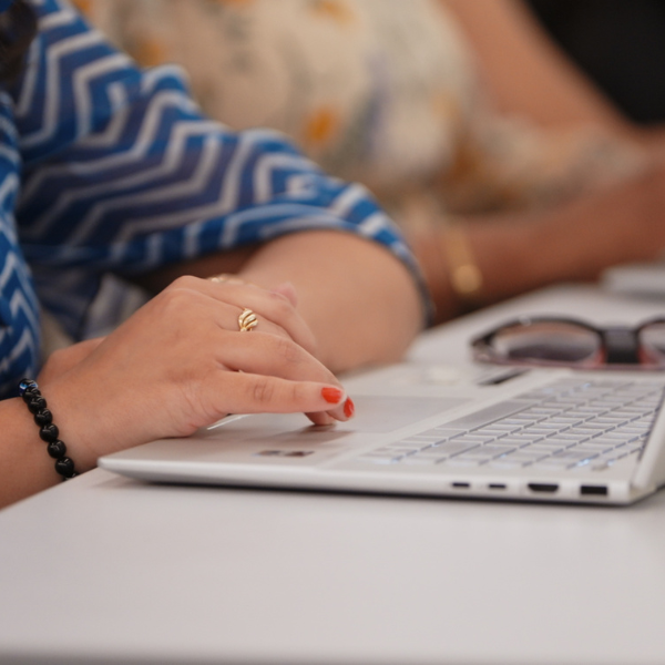 photo of early career student on laptop