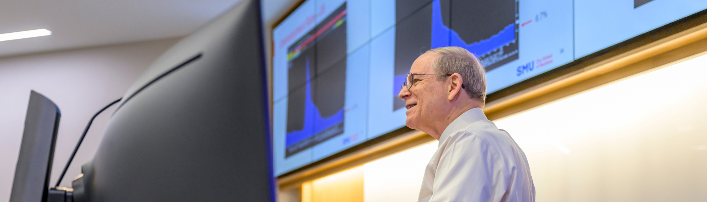 photo of Don Shelley teaching a course in a Cox classroom