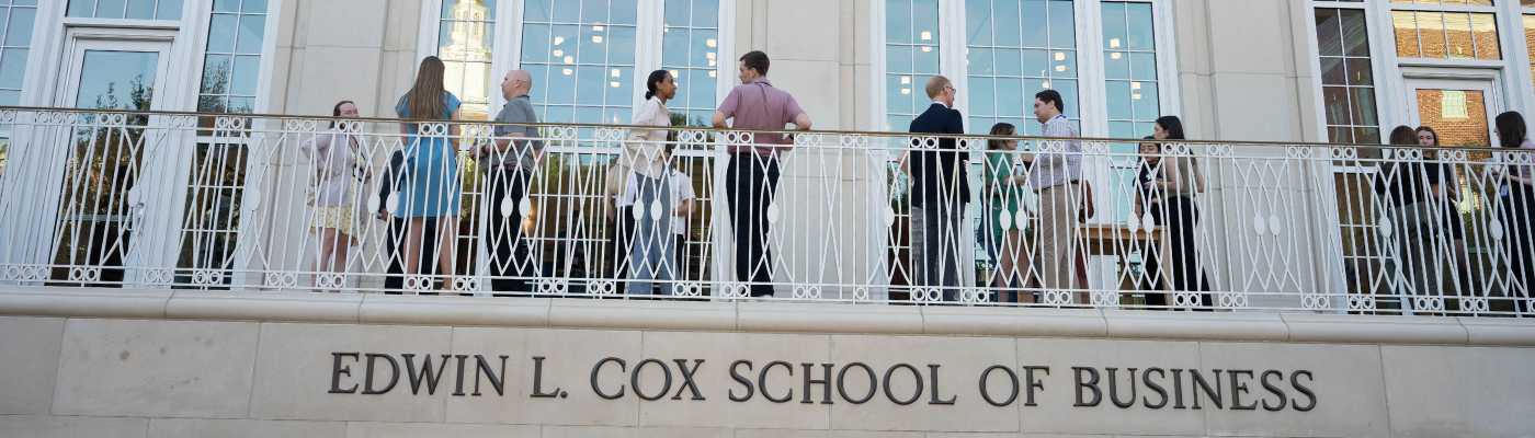 photo of students on the patio at SMU Cox