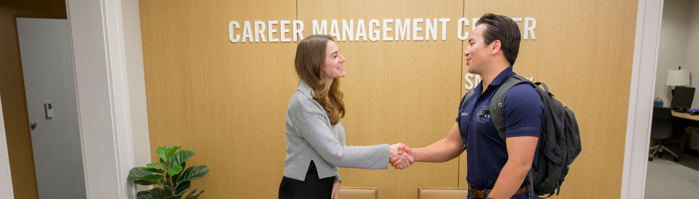 photo of student and career coach outside the CMC