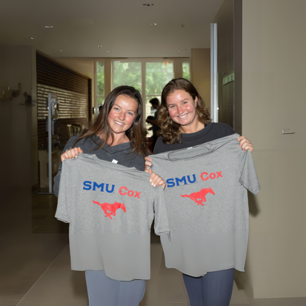 photo of two BBAs with SMU Cox shirts