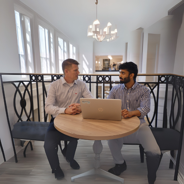 professor and student discuss homework assignment