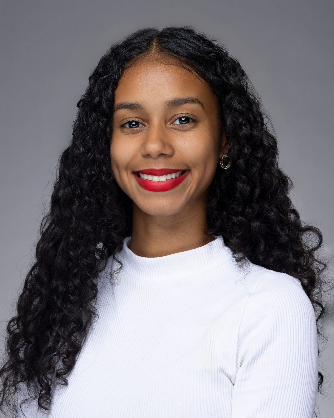 Headshot of Caitly Reynoso