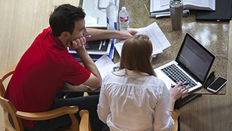 MBA students studying at Cox School