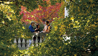 Students standing outside of the Cox School