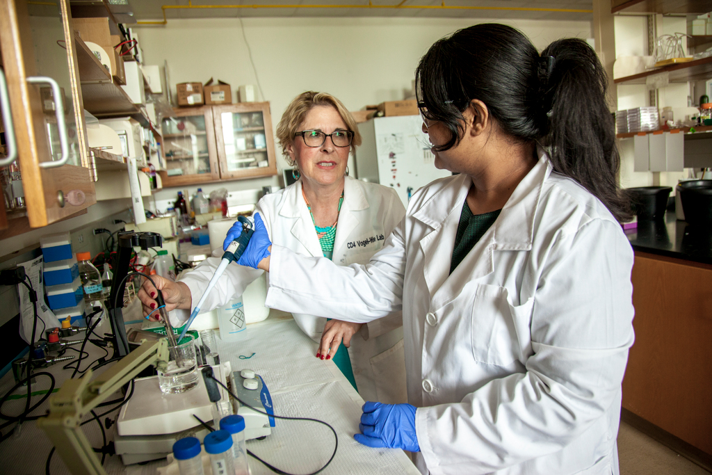 student and faculty in research lab