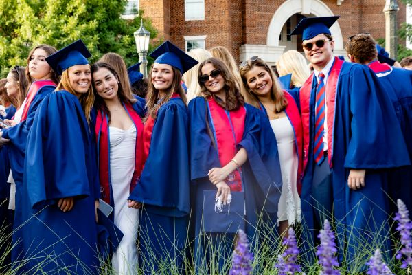 Group of undergraduate students in graduation regalia