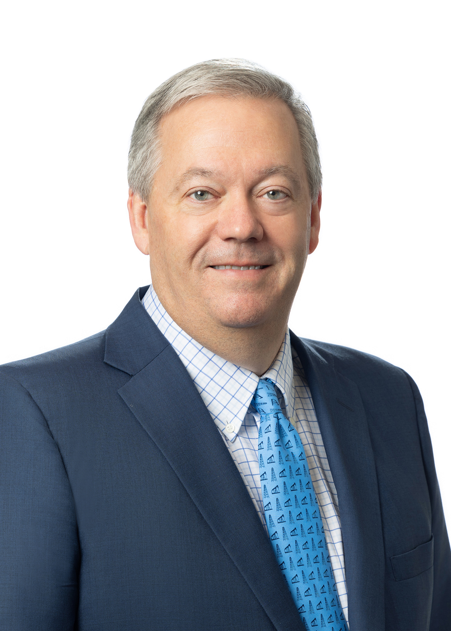 Steven Arata in a blue suit and blue tie