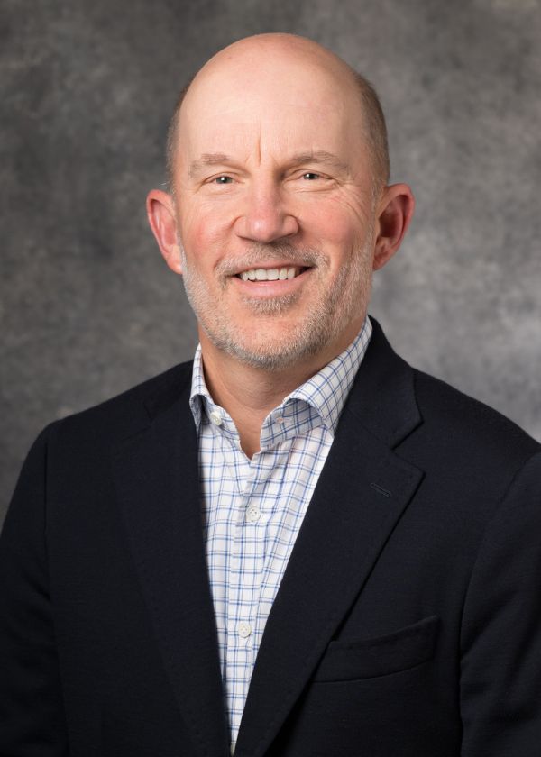 Professional headshot of Andrew McCullough