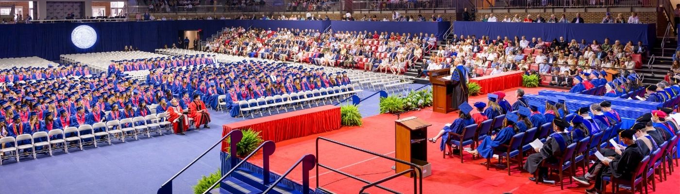 Wide angle shot of graduation ceremony in Moody Coliseum