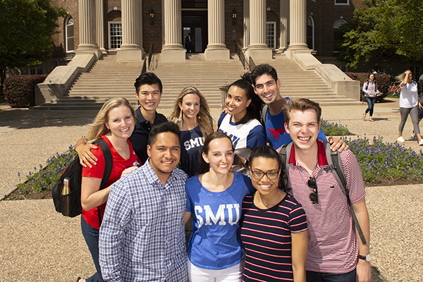 Group of Students standing in front of Dallas Hall.