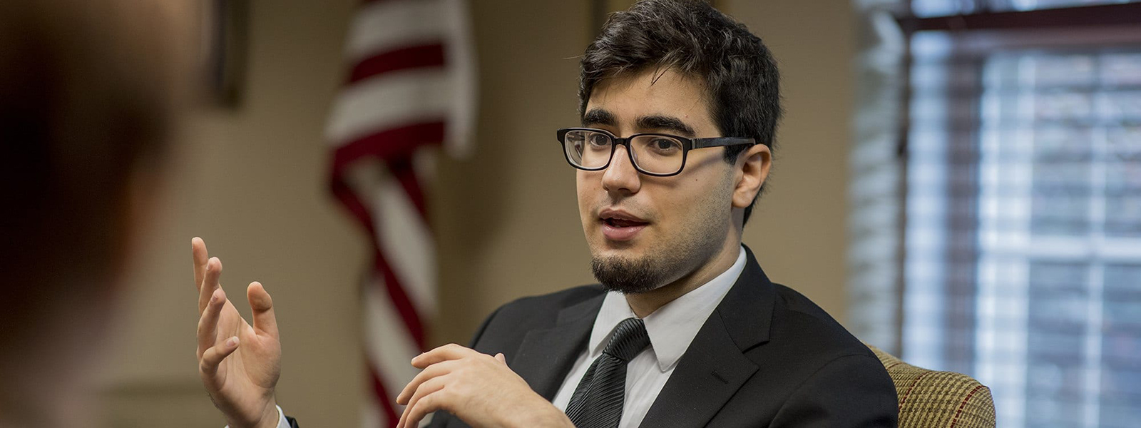 Student Kovan Barzani Seated. 
