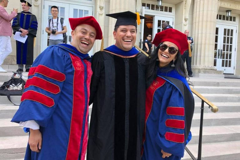 graduating students in gown