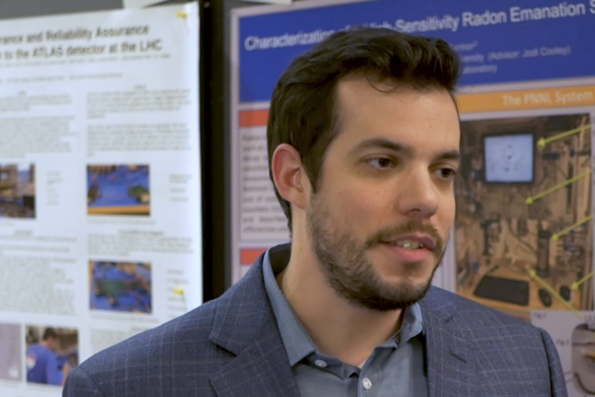 student presenting research