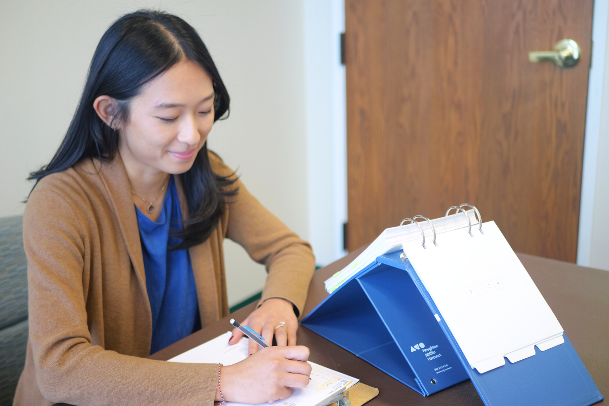 student sitting at table 