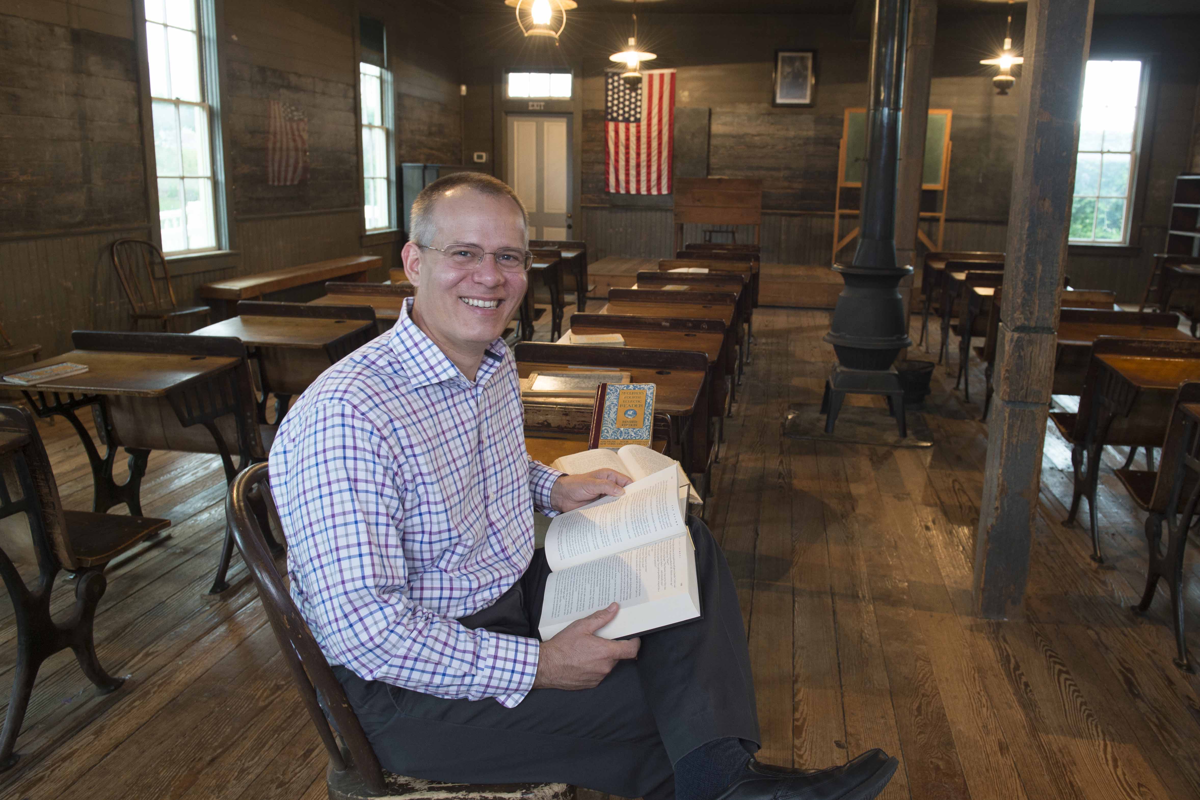 Mark Chancey sitting at desk