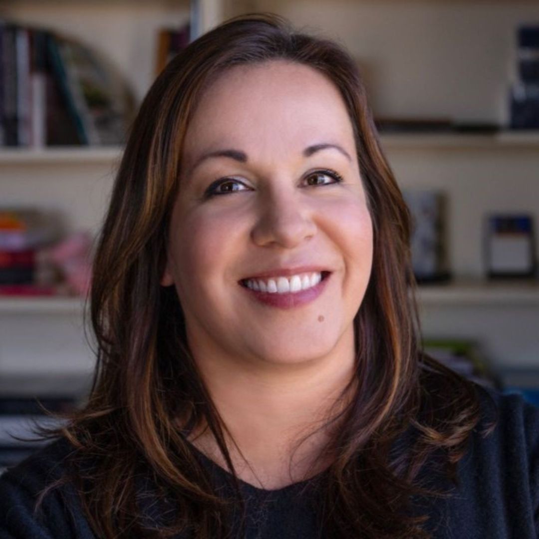 Photo of Betsy Nelson wearing a black shirt